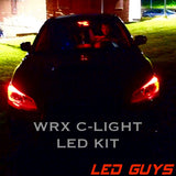 Red LED C-lights glowing at night on a Subaru WRX, with LED Guys branding