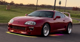 Underglow LED kit showcasing flexible, waterproof LED strips for easy car customization.